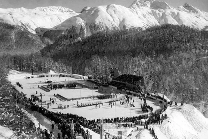 A large crowd of people gathered at the 1948 Winter Olympics in St. Moritz.