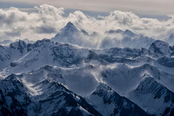 Stunning view of Mount Pilatus in Alpnach, Switzerland. It showcases its rugged peaks and lush landscapes, and the iconic cogwheel railway and aerial cableway lead to the summit, offering breathtaking panoramic views.